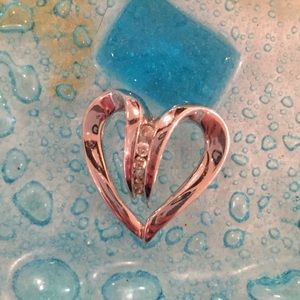 Diamond and white gold heart pendent